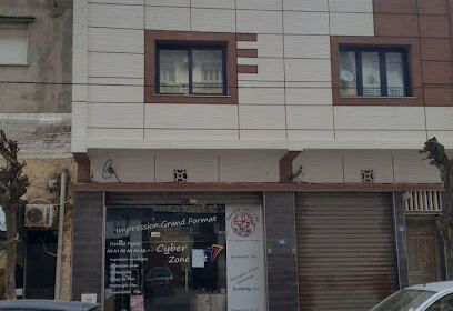 Cybercafé Zone net et point relais EMS