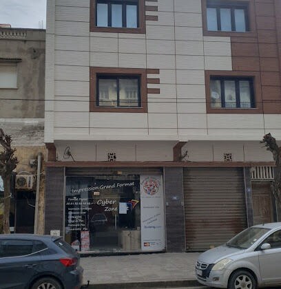 Cybercafé Zone net et point relais EMS